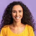 happy-person-portrait-of-smiling-woman-with-tanne-2025-03-18-18-56-37-utc.jpg